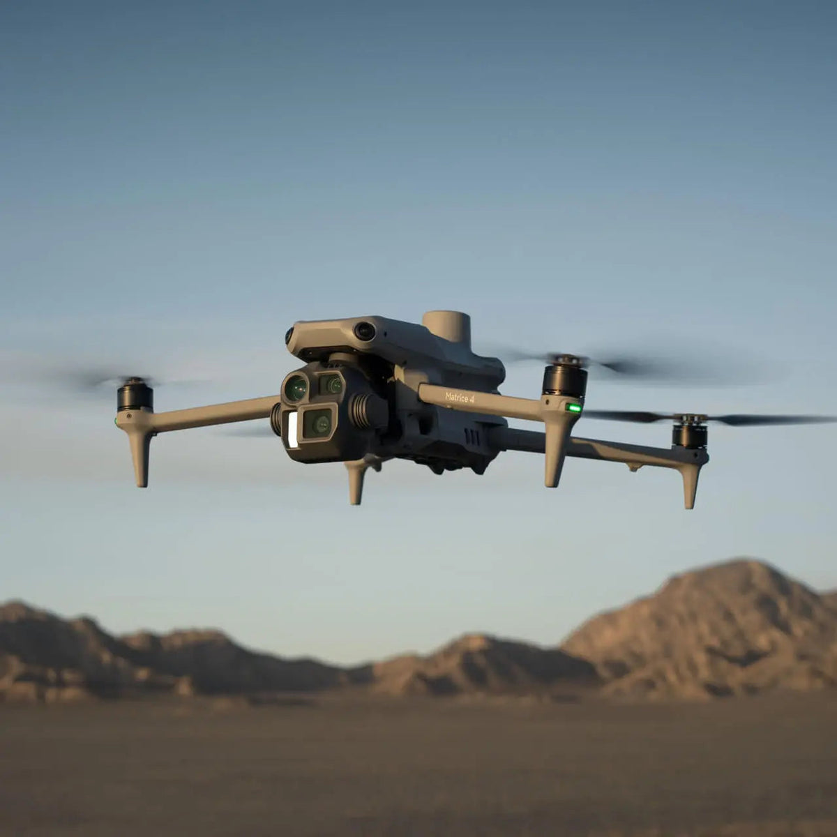 DJI Matrice 4E enterprise drone with high-resolution cameras and AI features for mapping, surveying, and industrial inspections.